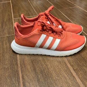 Adidas sneakers in orange